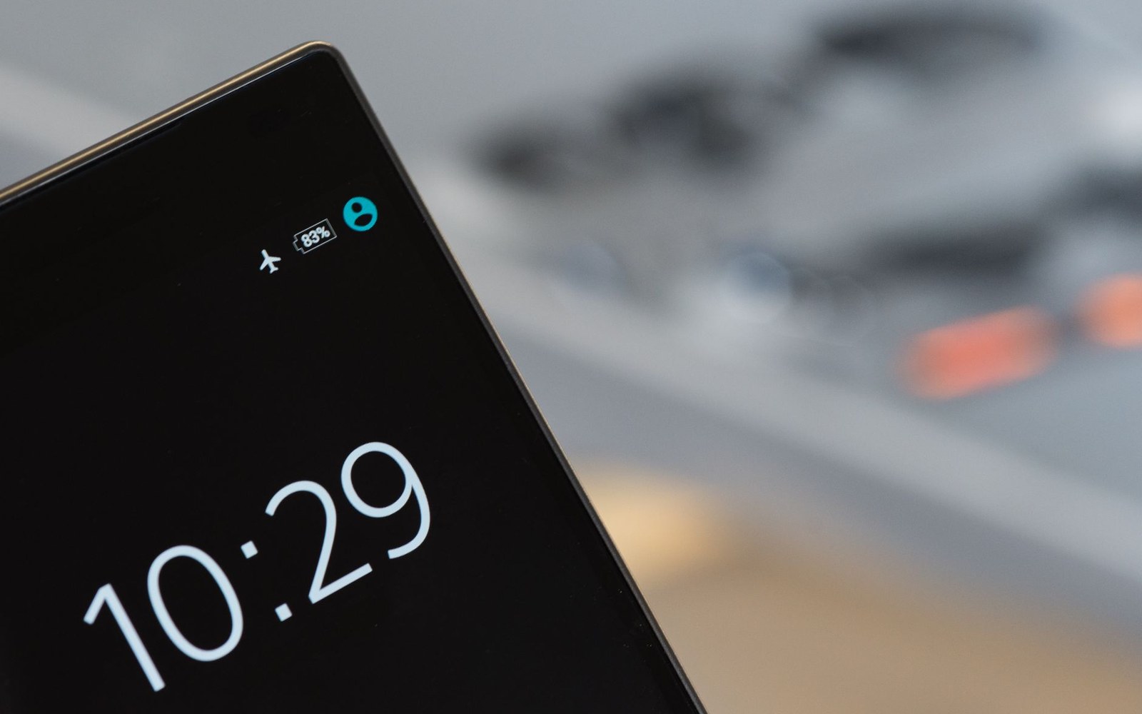 Smartphone lock screen showing 10:29, airplane mode, and 83% battery